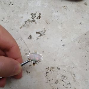 Opal and diamond ring in 14 K Gold